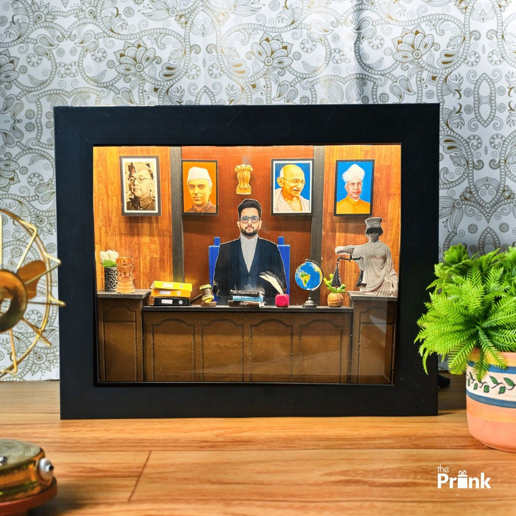 Framed image of a miniature judicial office. Includes a suited figure at a desk with books, a globe, a statue, and historical portraits on wood paneling.
